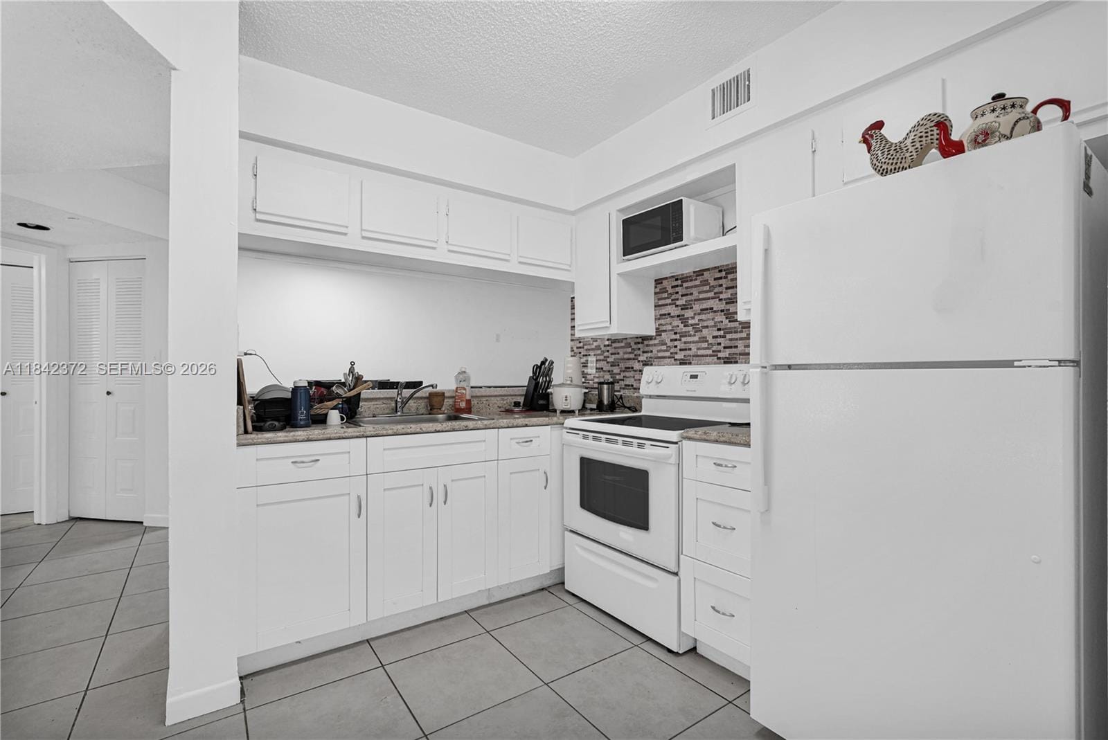 9159 SW 141st Place 9159 — photo 11