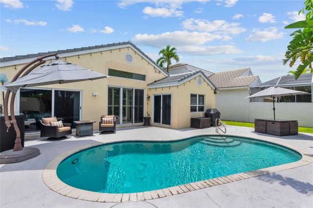 7904 Travlers Tree Drive, sold in Palms At Boca Pointe, Boca Raton, FL