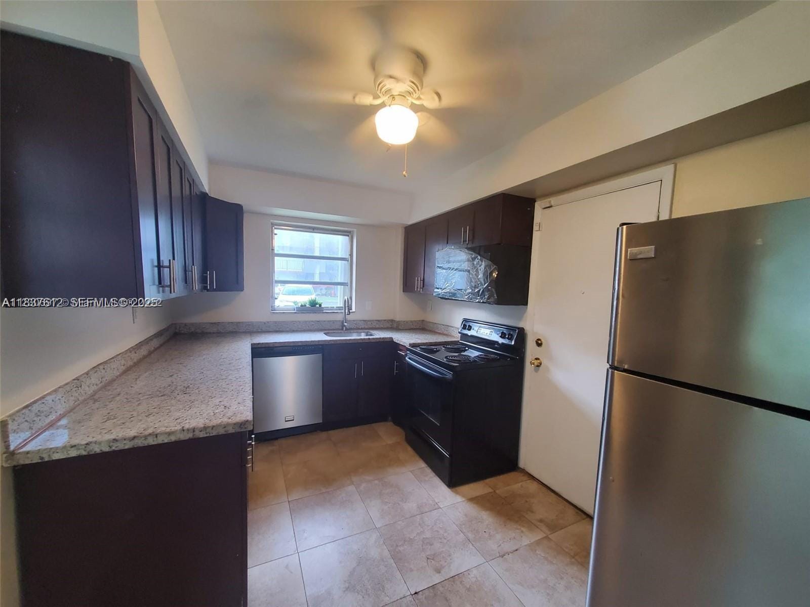 1450 NE 191st Street 106 — photo 2