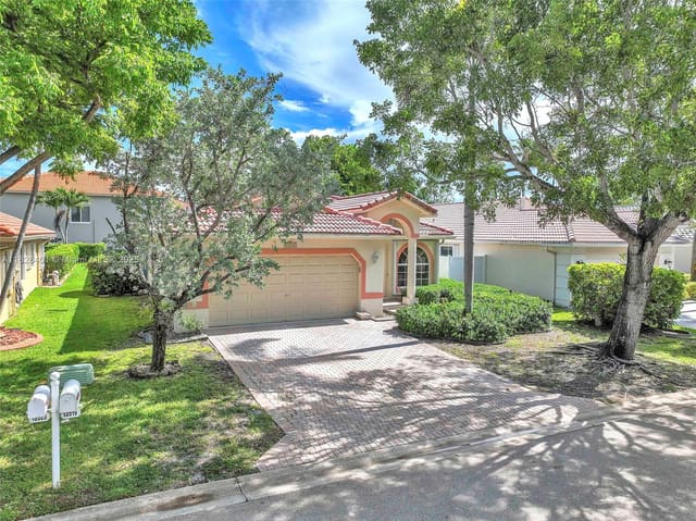 13519 NW 7th Street, sold in Sawgrass Village, Plantation, FL
