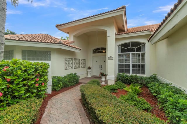 6041 NW 63rd Place, Parkland, FL 33067