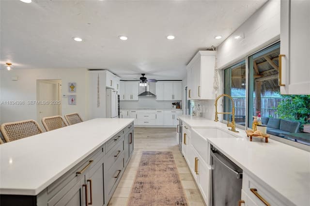 7735 Edgewater Drive, sold in Lake Clarke West, Lake Clarke Shores, FL