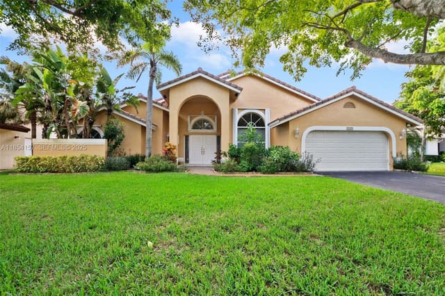 4635 NW 99th Lane, sold in North Springs Court, Coral Springs, FL