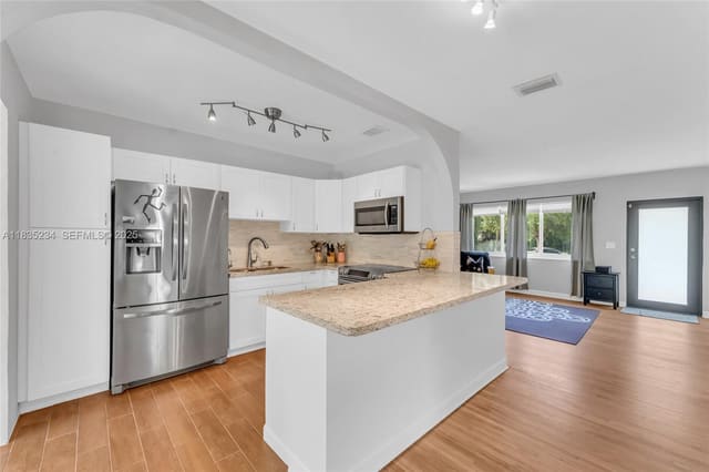 6023 SW 59th Street, sold in Cambridge Lawns Park, South Miami, FL
