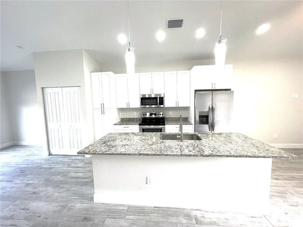 1530 W 26th Court — photo 4