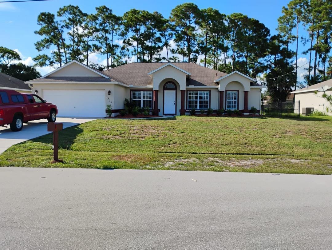1331 SW Ingrassina Avenue, Port St. Lucie, FL 34953