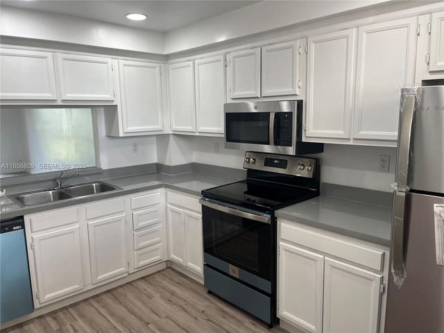 8735 Ramblewood Drive 413, sold in Sherwood Square Condomini, Coral Springs, FL