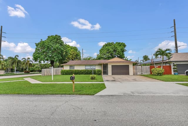 5001 Woodstone Circle, sold in Springhill 2, Lake Worth, FL