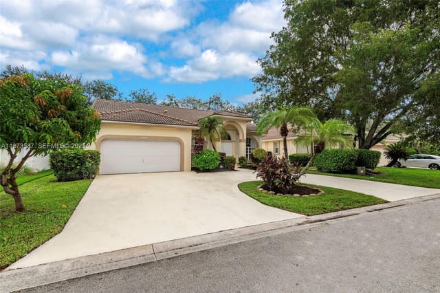 5959 NW 74th Street, sold in Parkwood, Parkland, FL