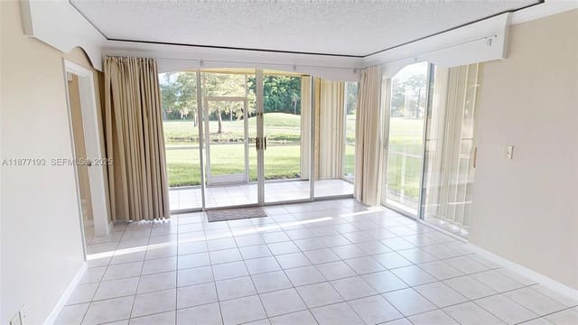 7598 NW 86th Terrace 103, sold in Woodmont Apt Homes 67a, Tamarac, FL