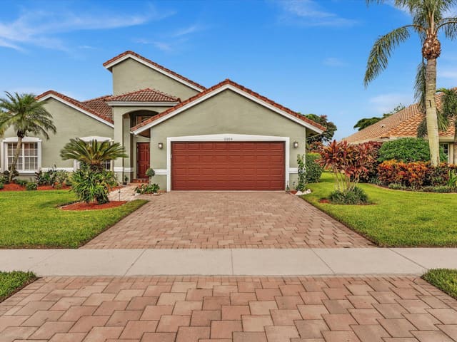 6004 Golf Villas Drive, sold in Golf Colony, Boynton Beach, FL