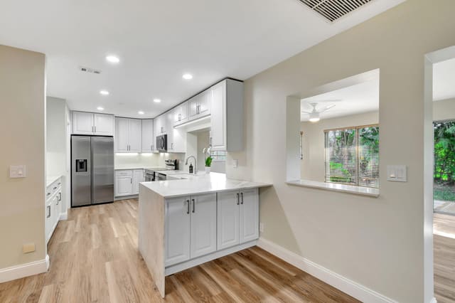 538 Forestview Drive, sold in Forestview Villas, Atlantis, FL