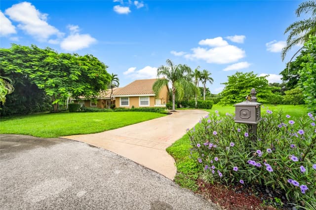 7604 Lexington Lane, sold in Cypress Head, Parkland, FL