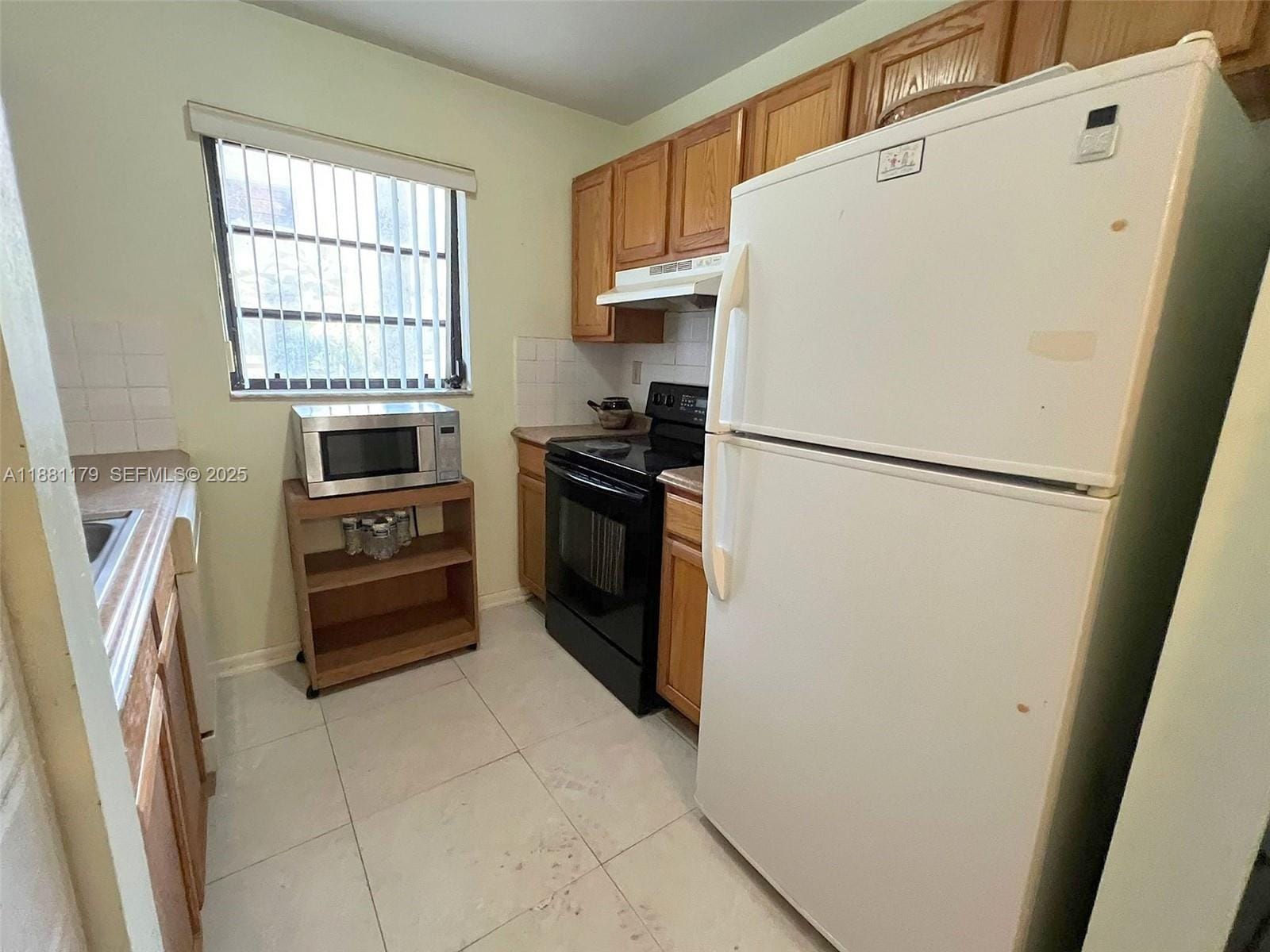6355 SW 136th Court 101J — photo 12