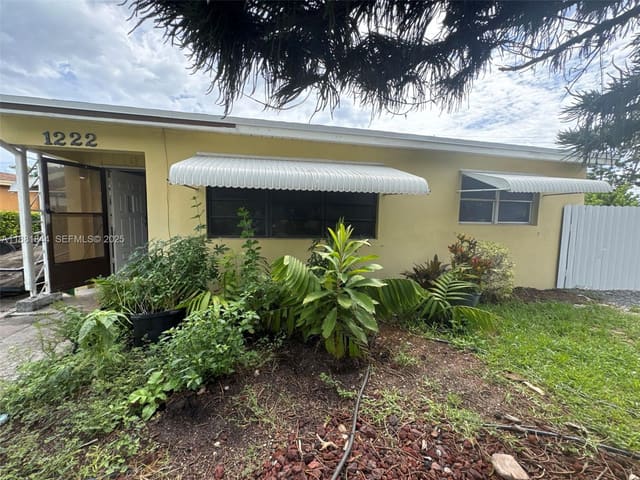 1222 S H Street, sold in Whispering Palms 5, Lake Worth Beach, FL