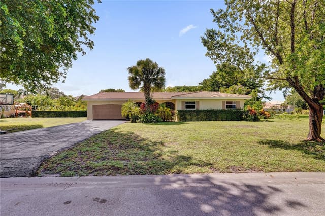 9060 NW 32nd Street, sold in Coral Springs Village Gre, Coral Springs, FL
