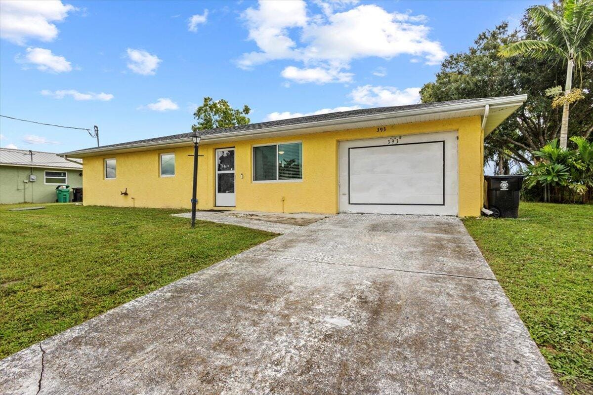 393 NW Curtis Street, Port St. Lucie, FL 34983