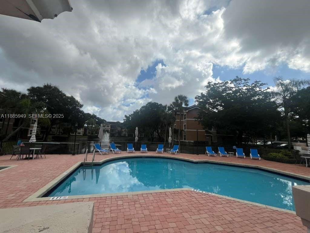 8821 Wiles Road 102, Coral Springs, FL 33067 photo 2