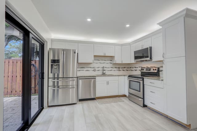 730 7th Lane, sold in Garden Lakes, Palm Beach Gardens, FL