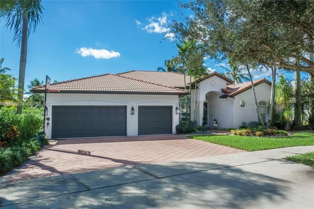 5173 Lakewood Drive, sold in Country Glen, Cooper City, FL