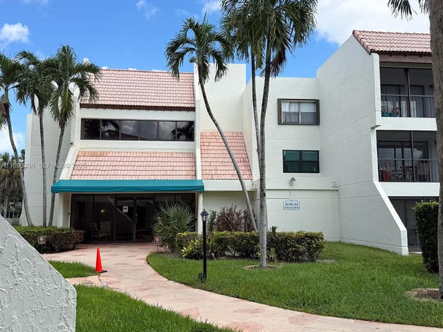 301 Racquet Club Road 203, sold in Building Four Of Racquet, Weston, FL