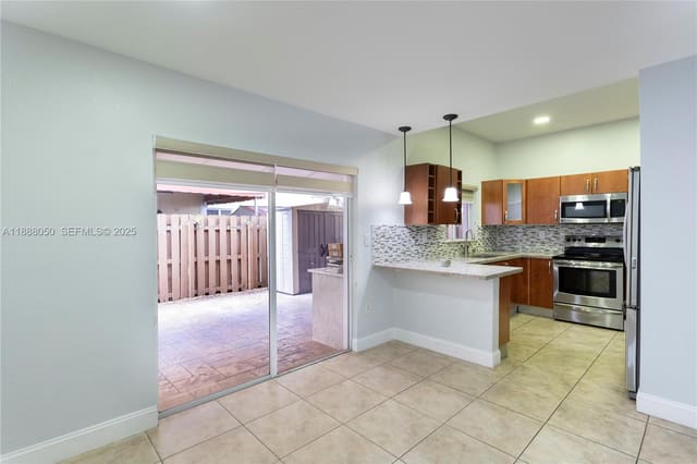 18038 NW 74th Court, sold in Tuscan Lake Villas, Hialeah, FL