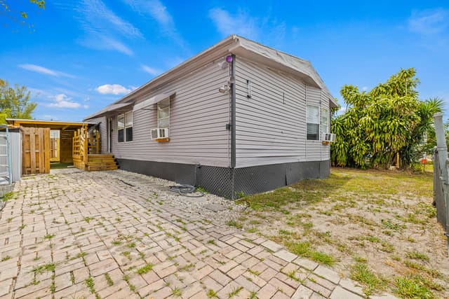 10592 SW Sandalfoot Boulevard, sold in Watergate Mobile Home, Boca Raton, FL