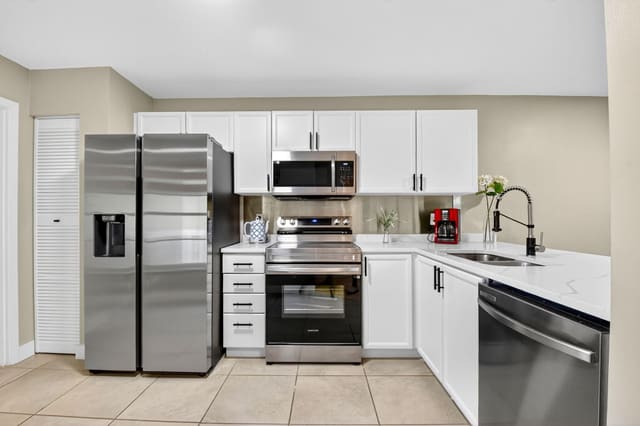 203 Maplewood Drive, sold in Joggers Run, Greenacres, FL