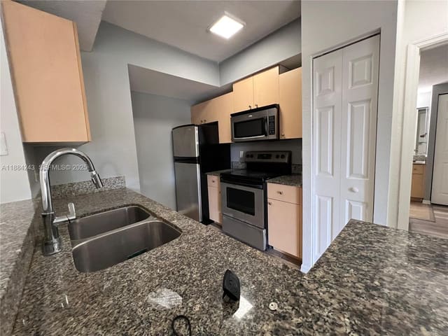 2400 Centergate Drive 102, sold in Aventine At Miramar Condo, Miramar, FL