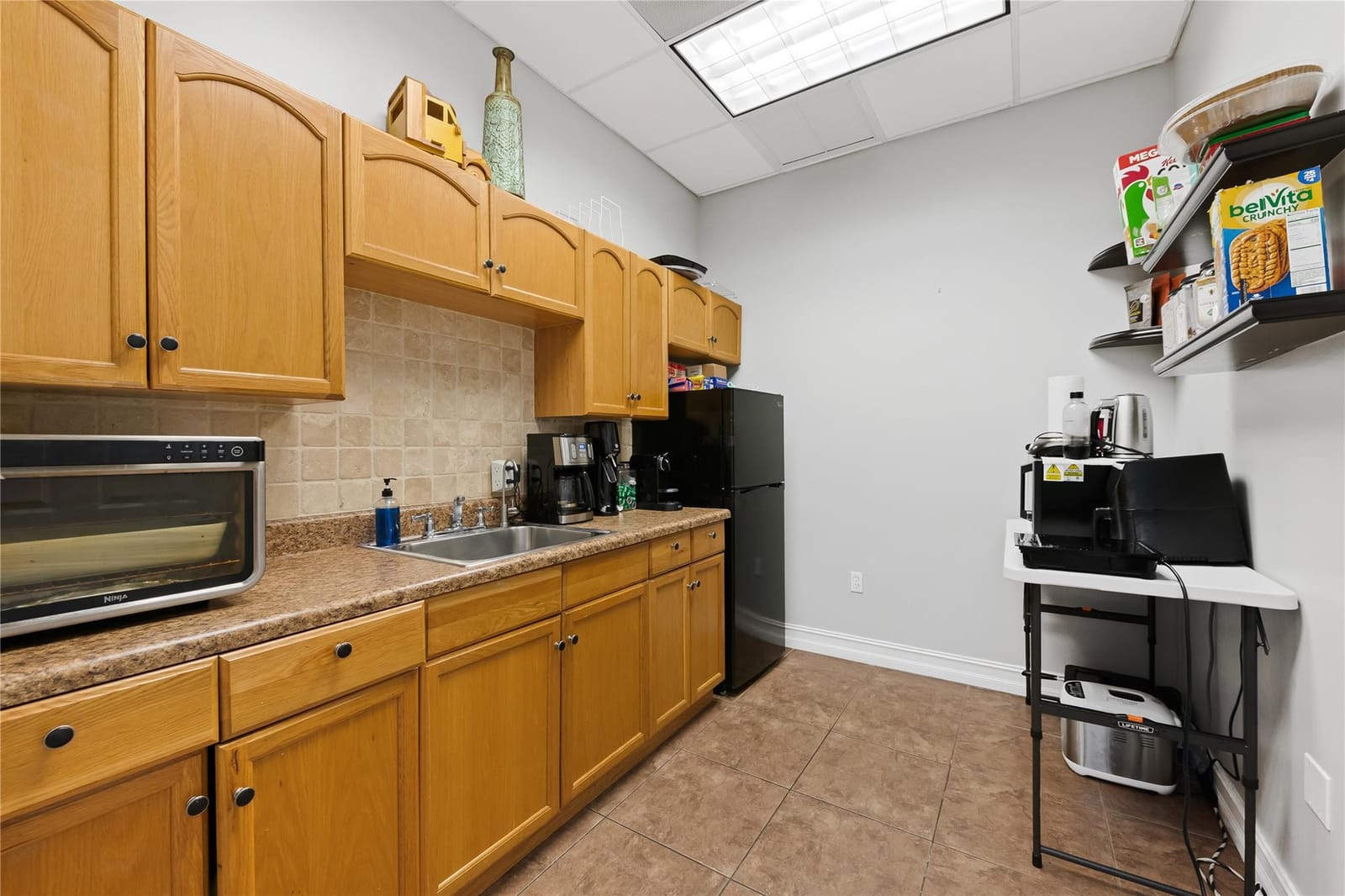 5497 Wiles Road 205 — photo 7