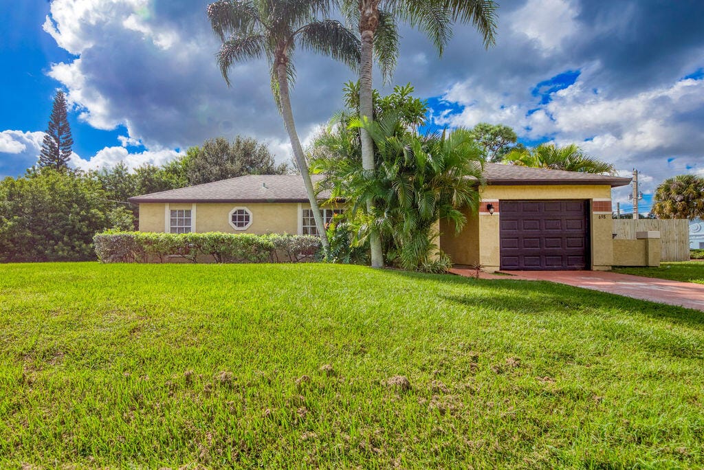698 SW Todd Avenue, Port St. Lucie, FL 34983