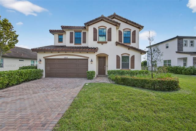 1310 Whitcombe Drive, sold in Bellasera, Royal Palm Beach, FL