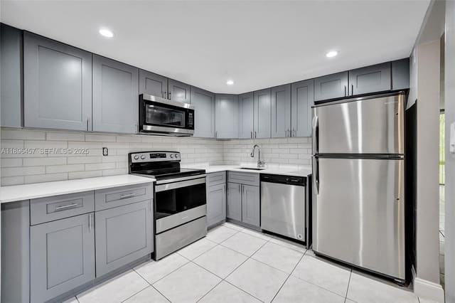 8401 W Sample Road 20, sold in Lafayette Condo, Coral Springs, FL
