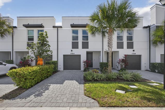 1764 Lindley Street, sold in Enclave At Mangonia Park, West Palm Beach, FL