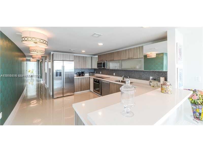 6700 Indian Creek Dr 908 908 — photo 9