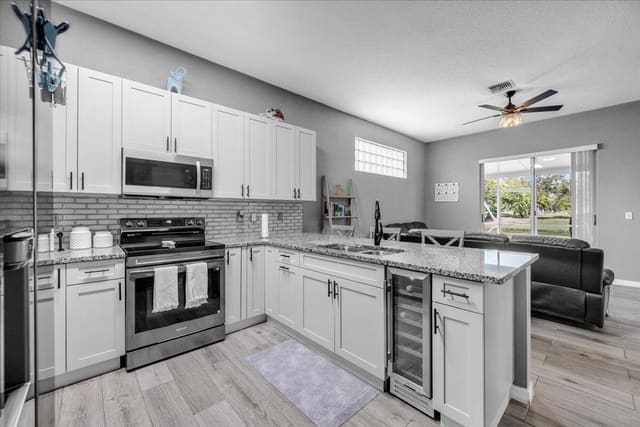 114 Prestige Drive, sold in Country Club Views, Royal Palm Beach, FL
