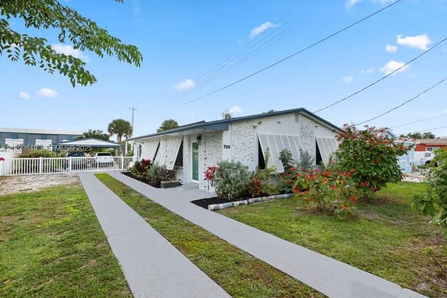 709 NW 7th Street, sold in Melaleuca Gardens, Dania Beach, FL