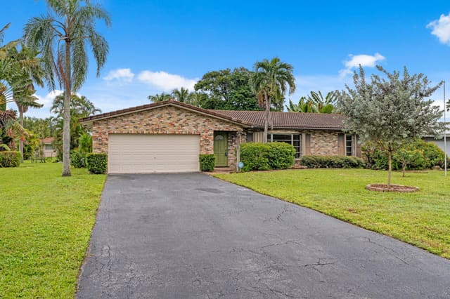8675 NW 28th Drive, sold in Forest Hills, Coral Springs, FL
