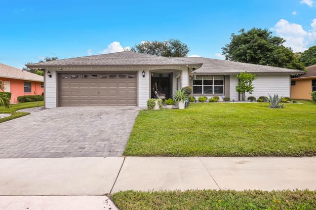146 Elysium Drive, sold in Elysium at Arbors, Royal Palm Beach, FL