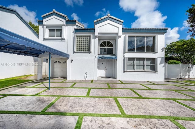 351 NE 211th Street, sold in San Simeon Homes, Miami, FL