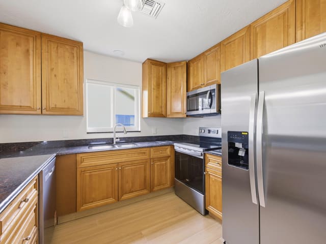 801 Maplewood Drive, sold in Joggers Run, Greenacres, FL
