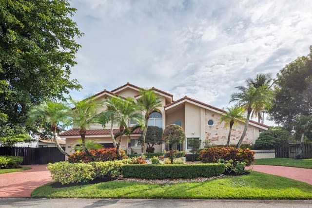 610 SW 101st Avenue, sold in Pebble Creek at Jacaranda, Plantation, FL