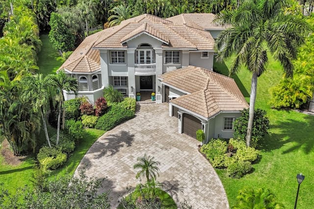 6454 NW 93rd Drive, sold in Grand Cypress Estates, Parkland, FL