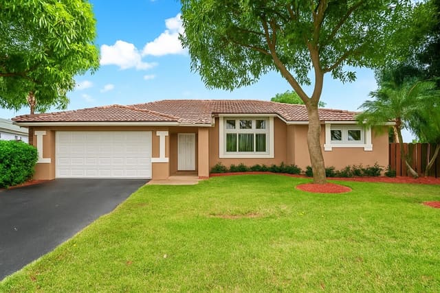 9861 NW 28th Place, sold in Diaflor Subdivision, Coral Springs, FL