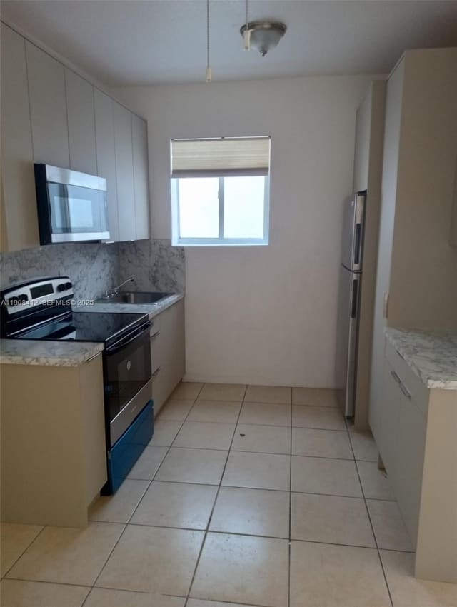 1021 NW 3rd Street 308, sold in River Lofts Condo, Miami, FL