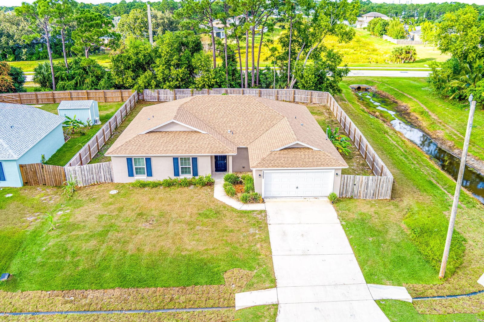 5957 NW Baynard Drive — photo 8