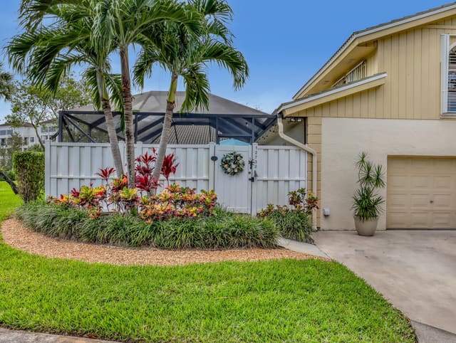 12732 Woodmill Drive, sold in Westwood Lakes 4 Westwood Gardens, Palm Beach Gardens, FL