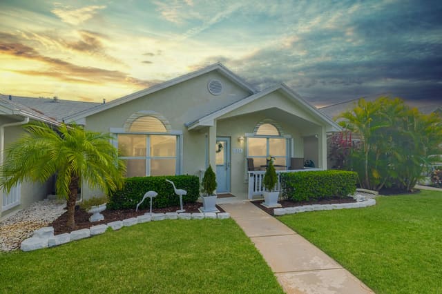 1120 NW Lombardy Drive, sold in Kings Isle - Isle Of Lombardy, Port St Lucie, FL
