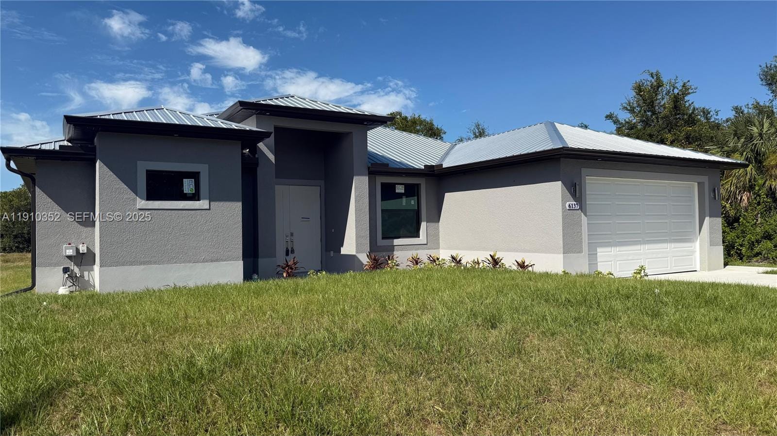 6137 Higgins Avenue, Lehigh Acres, FL 33905