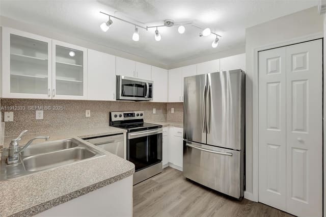 6141 NW 115th Place 352, sold in The Gates At Doral Isles, Doral, FL